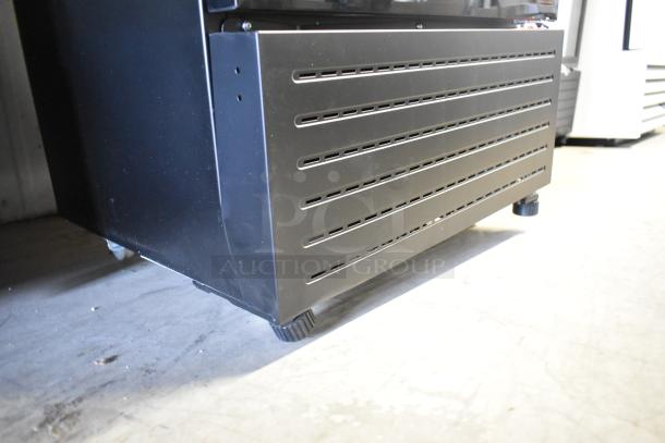 KoolMore KM-MDR-1GD-10C metal reach-in cooler on casters, poly-coated racks, brand new with minor scratches.
