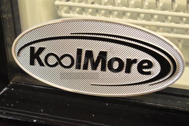 KoolMore logo on metal commercial single door reach-in cooler model KM-MDR-1GD-10C with poly coated racks.