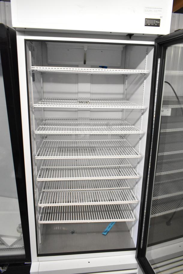 2021 True TSCI-600R-G-PH reach-in cooler, single glass door, poly-coated racks, 115V, excellent condition.