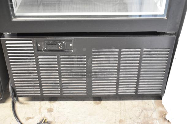 2019 Habco SE18 single door reach-in cooler with poly coated racks on casters. 115V, 1 phase. Visible minor wear.