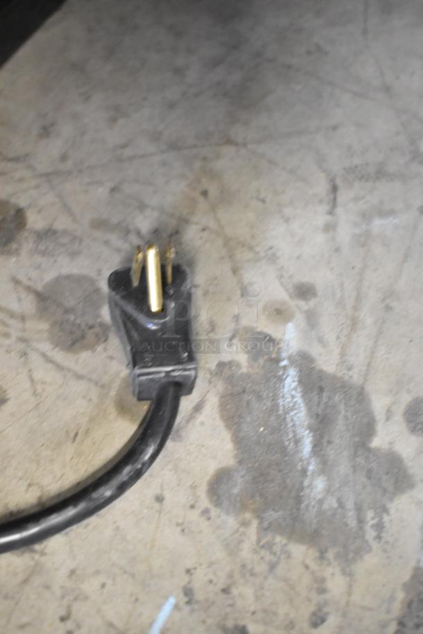 2019 Habco SE18 commercial reach-in cooler plug on concrete floor, 115V, 1 Phase, metal, on casters.