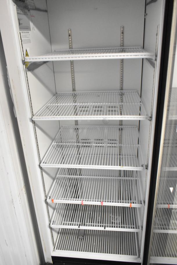 2019 Habco SE18 cooler, single door, metal, poly-coated racks, on casters, 115V, 1 phase, in good condition.