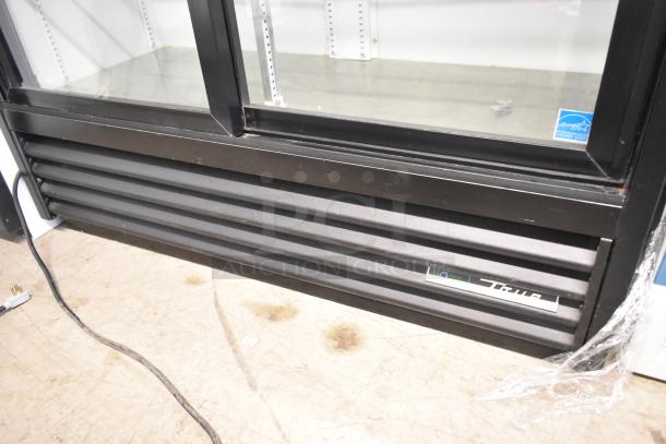 2020 True GDM-41SL-48-HC-LD commercial cooler with 2 doors, poly-coated racks, 115V, 1 phase. Model tag visible.