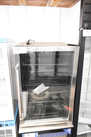 Frigidaire EFMIS155 metal mini cooler merchandiser, 115 volts, 1 phase, glass door, used condition.