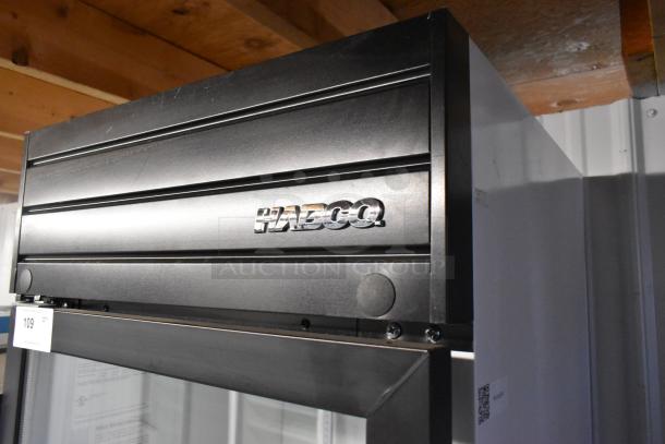 2019 Habco SE18 metal single door cooler merchandiser, poly coated racks, 115V, 1 phase, clear Habco logo, excellent condition.