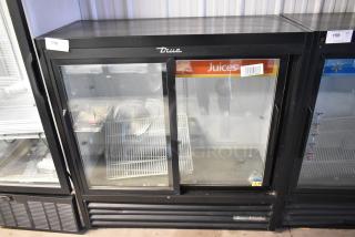 2018 True GDM-41SL-48-HC-LD metal commercial reach-in cooler with two glass doors, poly coated racks, visible label "Juices."