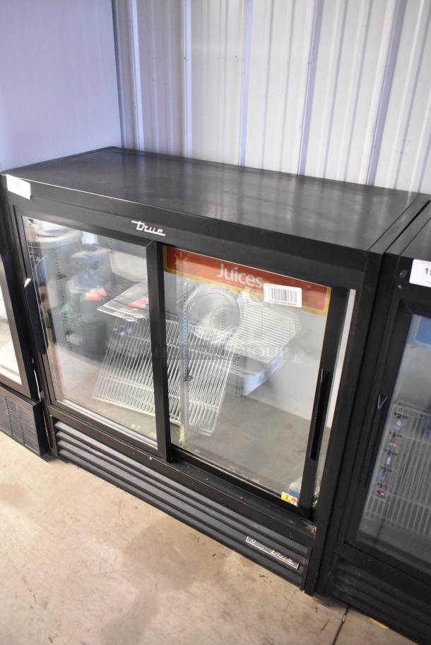 2018 True GDM-41SL-48-HC-LD metal commercial 2-door cooler, poly-coated racks, good condition, 115V, 1 phase.