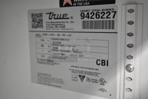 Label from a 2018 True GDM-41SL-48-HC-LD 2-door cooler, serial number 9426227, for outdoor use, UL certified.