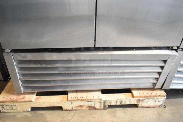 2017 True T-35 stainless steel commercial cooler, 2 doors, poly coated racks. 115V, 1 phase. Minor surface wear visible.