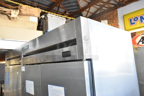 2018 True T-35 stainless steel commercial 2-door reach-in cooler with poly-coated racks, 115V, 1 phase, excellent condition.