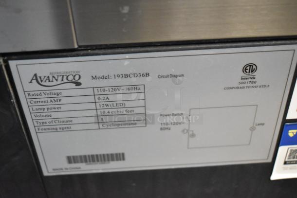 Avantco 193BCD36B 36" black bakery display case, new with glass damage. Label shows specs: 115V, 1 phase, 12W LED.