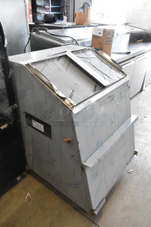 Brand new ServIt 423TCW46 stainless steel 46-gallon scratch and dent chip warmer, 120V, in original packaging.