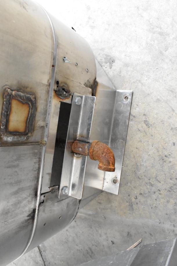 Curtis stainless steel commercial countertop automatic urn with visible rust on spout and wear marks on body.