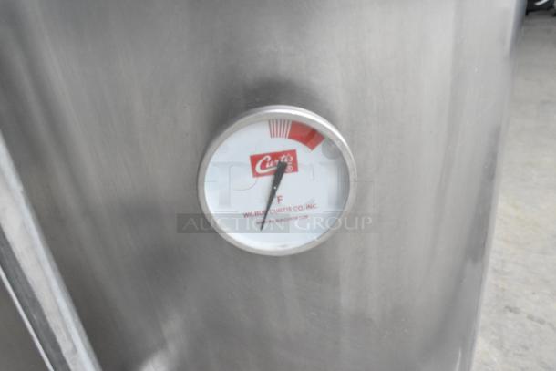 Curtis stainless steel commercial automatic urn with analog gauge, countertop model, excellent condition, ideal for cafes.