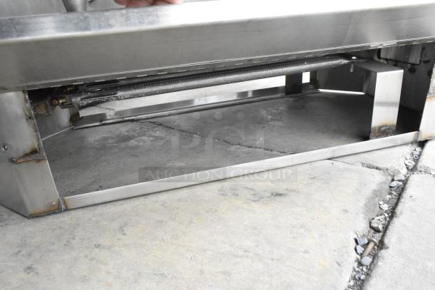 Curtis Stainless Steel Automatic Urn, commercial countertop model, sturdy build, shows some wear, no visible labels.