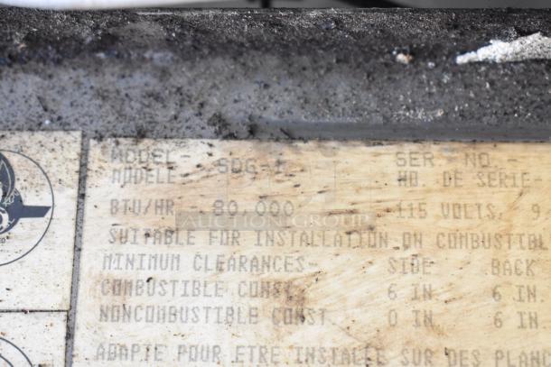 Garland SunFire SDG-1 convection oven label, showing model, 80,000 BTU power, installation suitability details.