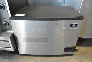 Manitowoc ID0606W-261D commercial ice head, stainless steel, 208-230V, 1 phase, visible wear, Manitowoc logo.