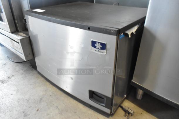 Manitowoc ID0606W-261D stainless steel commercial ice head, 208-230 volts, 1 phase. Visible logo, used condition.