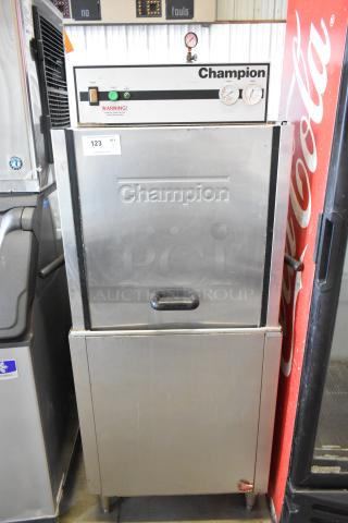 Champion DLF stainless steel commercial straight pass-through dishwasher, 208-240V, 3-phase; features visible gauges and controls.