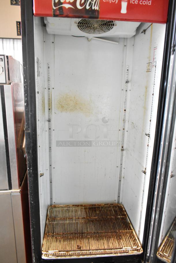 Imbera G318 commercial cooler, single door, 115 volts, 1 phase. Shows signs of use with visible interior wear.