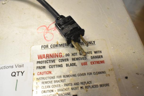 Prawnto MLG-1 shrimp deveiner plug with safety warning label; commercial use, 115V, 1 Phase, metal construction.