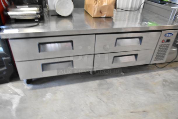 Atosa stainless steel 4-drawer chef base with commercial casters, 115 volts, 1 phase, in good condition.