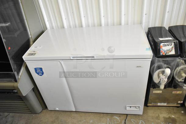 Brand new Danby DCF100A6WM metal chest freezer with hinge lid. Some scratches and dents. 115 Volts, 1 Phase. Tags visible.