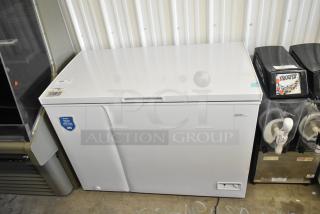 Brand new Danby DCF100A6WM metal chest freezer with hinge lid. Some scratches and dents. 115 Volts, 1 Phase. Tags visible.