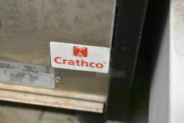 Crathco stainless steel countertop 2-hopper slushie machine, 115 volts, with visible Crathco branding tag.