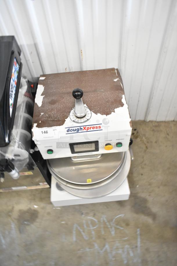 Dough Xpress DXE-W metal commercial countertop dough press, 120 volts, 1 phase. Shows wear, visible logo and control buttons.