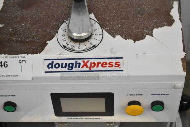 Dough Xpress DXE-W countertop dough press, metal, 120V, 1-phase. Features cycle start/stop buttons and thickness dial. Worn surface.