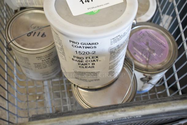 15 Pro Guard coating cans in shopping cart, including 1520-2 Pro Flex Base Coat. Labels indicate industrial use. Shopping cart not included.