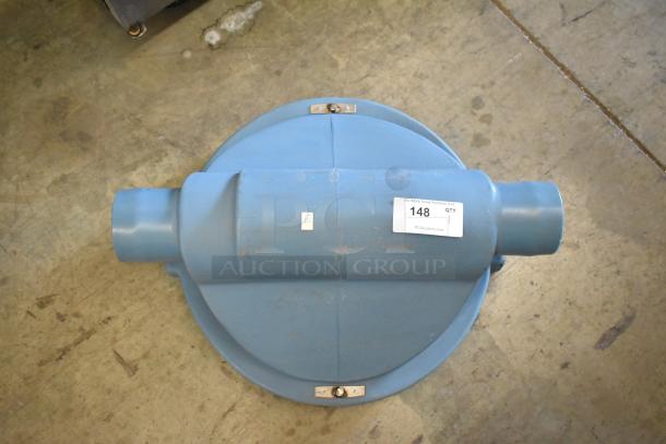 Trapzilla grease trap piece, blue, cylindrical shape, appears in good condition. Label indicates item no. 148, PCI Auctions.