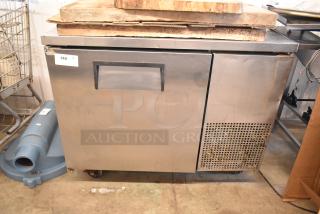 True TUC-44F stainless steel undercounter freezer, single door, 115 volts, used condition, with a visible auction tag.