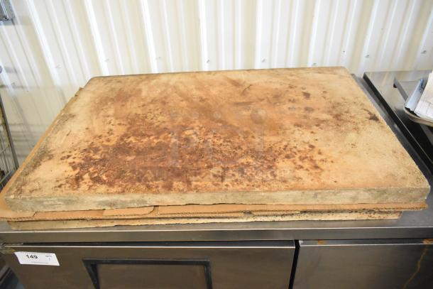 Two cutting boards, one rustic wooden, noted for its aged patina. Includes storage surface beneath.