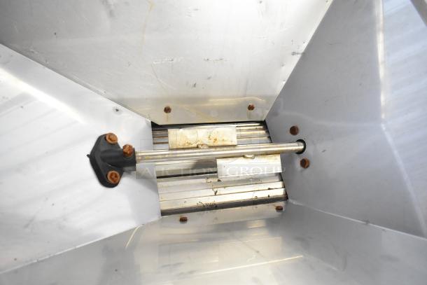 Pillan Metal Commercial Countertop Cookie Depositor, stainless steel, visible wear, internal view showing metal components.