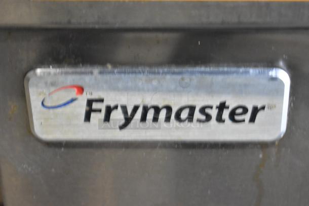 Frymaster stainless steel commercial rethermalizer, floor style, on casters. Visible Frymaster branding; used condition.