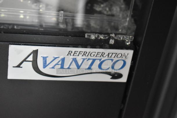 Avantco black extra deep vertical open air merchandiser with LED lighting. Model 193VOA48B. Visible glass damage.