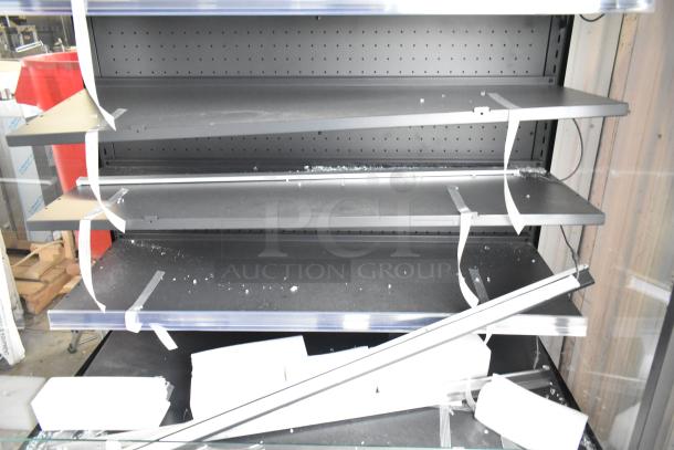 Avantco Black Extra Deep Vertical Open Air Merchandiser, model 193VOA48B, LED lighting, visible glass damage, new condition.