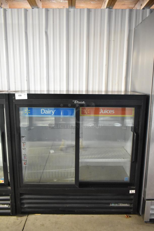 2019 True GDM-41SL-48-HC-LD 2-door reach-in cooler, metal, poly-coated racks, 115V, 1 Phase, dairy and juices labeled.