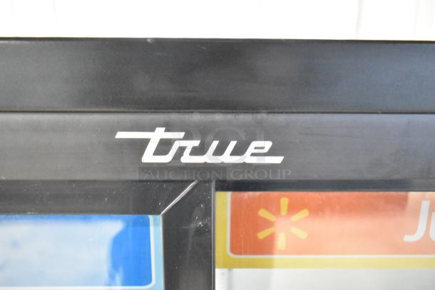 2019 True GDM-41SL-48-HC-LD cooler, black metal, True logo visible, for commercial use, poly-coated racks included.