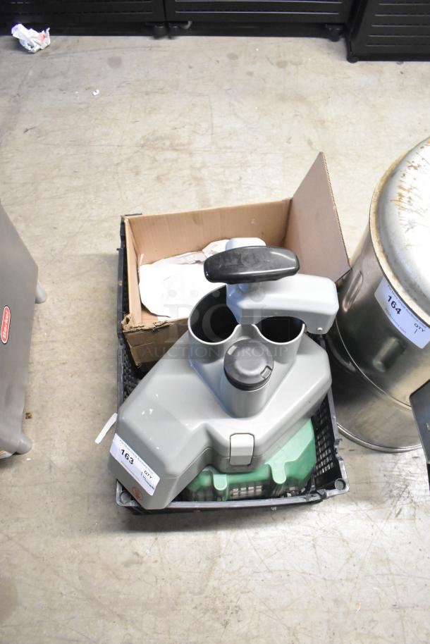 Robot Coupe continuous feed head for food processor, gray, in box. Tags show item number 163. Appears in good condition.