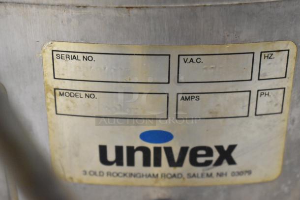 Univex commercial potato peeler, metal, 115 volts, 1 phase. Worn label with serial and model number spaces, Salem, NH address.