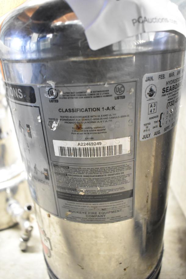 Buckeye Wet Chemical Fire Extinguisher, showing ULC and UL listings, classification 1-A:K, and serial number A22469249.