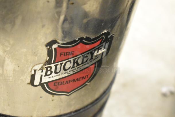 Buckeye Wet Chemical Fire Extinguisher, stainless steel, visible wear, "Buckeye Fire Equipment" label, pickup only.