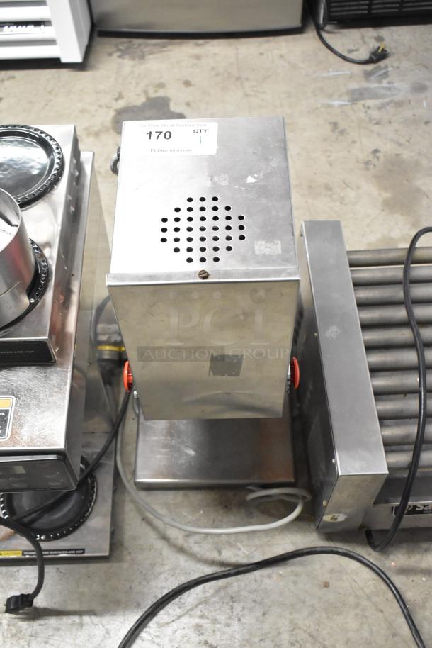 Stainless steel unit, 115 volts, 1 phase, in used condition. Features ventilation holes and a red control knob.