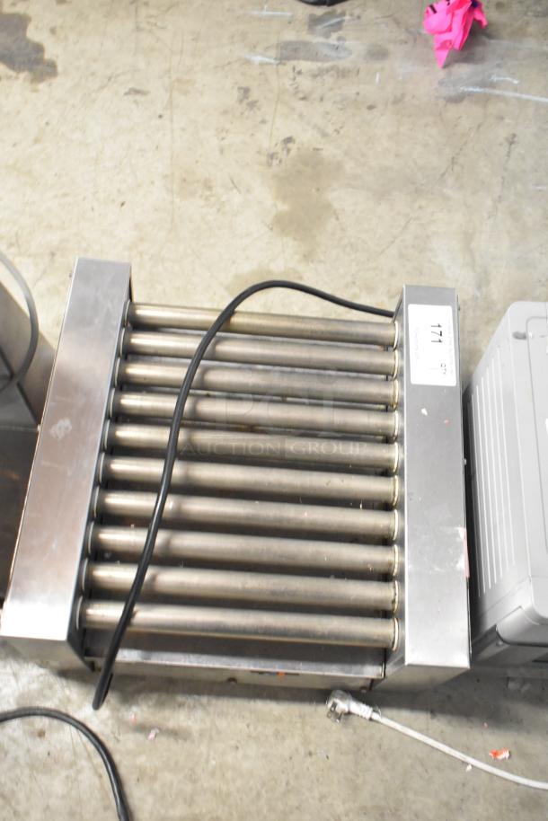 Savory stainless steel commercial countertop hot dog roller with multiple rollers, power cord attached, in used condition.