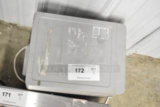 Frigidaire Gallery EFIC220-GREY-6COM ice machine, self-contained, 115 volts, 1 phase, gray, visible wear and label markings.