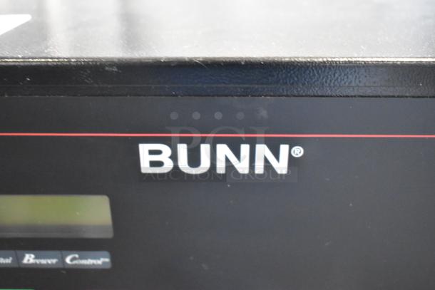 Bunn metal commercial countertop coffee machine, dual servers, metal brew baskets, 120/208-240 volts, 1 phase. Brand logo visible.
