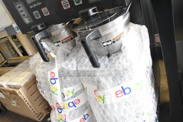 Bunn metal commercial double coffee machine with two satellite servers, two metal brew baskets, and control panel. 120/208-240V, 1 phase.